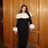 Photo by Abla Sofy \ud83e\udd0d on February 20, 2024. May be an image of 1 person, sable coat, goosedown coat and dress.