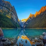 A Panoramic View of Sunrise at Lake Louise, Banff National Park, Canada - [OC] [5472x2344] - Author: jm4tlRed on Reddit - #travel #photography #travelphotography #nature #photooftheday