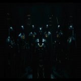 Brand New Suit Vault full of Old and NEW Burtonverse Batsuits from #TheFlashMovie TV Spot. I see a Blue and Grey suit, the 1989 suit, the Returns suit, what looks like an Underwater Suit, and what might be an Armored suit on the far left and a Desert