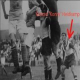 He gained the nickname "Grenadier" due to his shot power, he impressed on the left side of defense with his notable qualities being his strength in tackles and great passing range. He was a role model on and off the pitch, leading to him becoming the