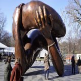 The Embrace, a 22-foot-tall bronze sculpture of interlocking arms that commemorates Martin Luther King, Jr. (GRS&rsquo;55, Hon.&rsquo;59) and his wife, Coretta Scott King&mdash;who met while King was a student at BU&mdash;will be unveiled today at th