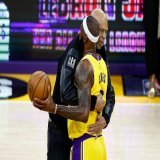 LeBron James hugs Kareem Abdul-Jabbar at mid-court moments after he surpassed the Lakers legend on the NBA's career scoring list. Abdul-Jabbar stood as the league's leading scorer since 1984.   : Ronald Martinez/Getty Images