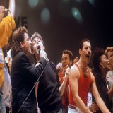 Bono, Paul McCartney, and Freddie Mercury at Live Aid, 1985. Photo by PA Images via Getty Images