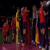 Moment president of Spanish FA kisses player on the MOUTH during trophy presentation after Spain's 1-0 win against England in World Cup final