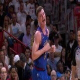 Christian Braun with the TOUGH bucket over Jimmy Butler