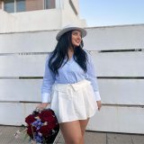 Photo shared by Derouich Fadwa on February 03, 2024 tagging @fashionnova. May be an image of 1 person, boots, top and skirt.