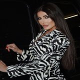 Photo shared by Heba Nour on December 25, 2023 tagging @hildadaagher, @mk.visionn, and @zeina.tawk. May be an image of 1 person, makeup, hair, dress and top.