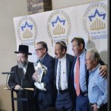 Dr. Stephen Soloway is presented with a Talis from Jerusalem in honor of his 60th birthday at the Israel Heritage Foundation book signing of former Vice President Mr. Pence.  Picture R-L Mr. Jerry Wartski, Mr. Jonathan Burkan, Dr. Joseph Frager, Dr S