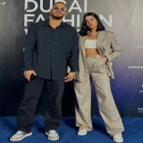 Photo shared by Jessie on February 08, 2024 tagging @greg_agopian. May be an image of 2 people, sweatpants, carpet, sweatsuit and text.