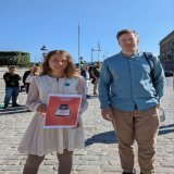 Грета Тунберг з плакатом українського художника Андрія Єрмоленка.