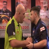 ???????????? ???????????????????????? ???????????????????????? ????????????????   Michael van Gerwen defies a nine-dart finish from Josh Rock (103.9) to seal an epic 10-8 victory with a 107.7 average and four ton-plus finishes for a place in the Quar