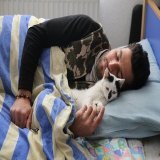 The mom lady is making me post this. Our favorite Turkish earthquake rescue worker with his new best friend.