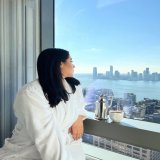 Photo by Holly Luyah on November 15, 2023. May be an image of bath robe and robe.