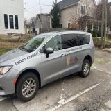 Literally parked on top of a plastic ballard.  I shouted at her YOU ARE PARKED IN THE BIKE LANE.    She opened her window to tell me that "I'M DOING MY PAPERWORK AND NOT HURTING ANYONE."  I said again, "You are in the bike lane" and she shouted back,