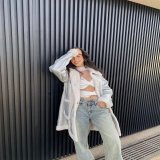 Photo shared by Narjis Assal on January 20, 2024 tagging @fashionnova. May be an image of 1 person, overcoat, top and jacket.