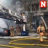Firefighters battled a massive fire in Buffalo, New York. Video from the fire department&rsquo;s Facebook show firefighters being knocked to the ground from an explosion while battling the fire.