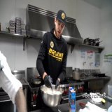 Cooking up some crepes.  Apparently, the birthday boy knows his way around the kitchen.  #BehindTheB | @ajgreer_10