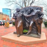 The City of Boston has a 10-foot tall bronze sculpture in the South End depicting Harriet Tubman leading a group of people up North to freedom, the first memorial erected in Boston to a woman on city-owned property.
