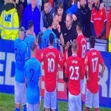 Horrible scenes seeing the ref surrounded like that.  Arsenal are getting a hell of charge from the FA after that.