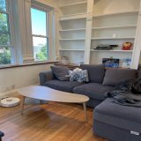 Before &amp; after  updates to this dining area:  - low table and floor cushions for intimate dinners  - 2 accent chairs which can convert to fireside chats for mini dinner parties  - and of course, lots of book spirits!