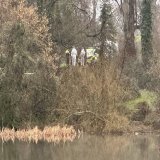 A garda forensic team examines an area of Santry park in Dublin cordoned off as part of the investigation into the disappearance of Icelandic man Joe Jonsson who went missing in Dublin five years ago, more @rtenews