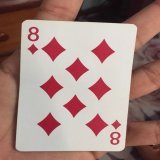 How old were you when you first noticed the "8" in the middle of the 8 of diamonds card?