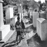 Solola residents visit the local cemetery. Guatemala, Central America. Gary Moore photo. Real World Photographs. #photography #cemetery #guatemala #photojournalism #blackandwhite #nikon #sweden #canada #malmo #realworldphotographs #garymoorephotograp
