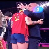 This guy kissing Jennifer Hermoso is apparently the head of Spain's soccer federation,   Now that she has come out to say that the kiss was uncomfortable, he should just resign Because they will take shovel dig six feet and put him under.
