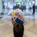 Malaysian search and rescue personnel being celebrated by his family members during the arrival of the Malaysia search and rescue operation unit of the Turkiye earthquake tragedy at Kuala Lumpur International Airport in Sepang, 23 February 2023. - Pi