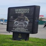 Ukraine does have a soft spot for Nazis or atleast they do entertain a lot of Nazi symbolism. This is an advertisement on Lviv streets with a Ukrainian soldier holding a flag with the SS Nazi Totenkopf. They should think about this stuff, not a good 