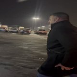 Coach showing love in freezing cold.
