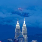 No, it is not a UFO, but a city above the clouds that can be seen peeking through the KLCC Twin Tower      PETRONAS Twin Towers, Kuala Lumpur  IG:  rj.rongjie  #MalaysiaTrulyAsia #CutiCutiMalaysia #KualaLumpur #travel #skyscrapper #travelphotography
