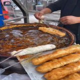 Delicious! Street breakfast for China people. fried dough sticks and eggs.