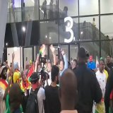 Ghana fans celebrating South Korea win which knocks out them and Uruguay