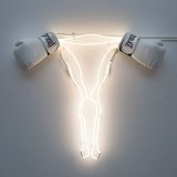 'Neon uterus with boxing gloves ovaries' by artist Zoe Buckman #WomensArt