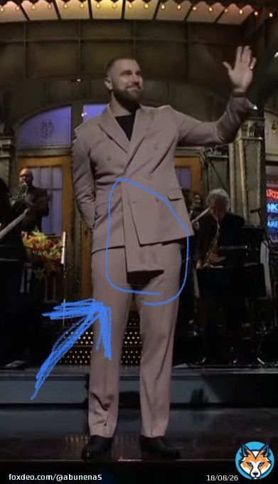What the hell is this extra attachment on this otherwise gorgeous suit? #snl #SaturdayNightLive #TravisKelce #NBC