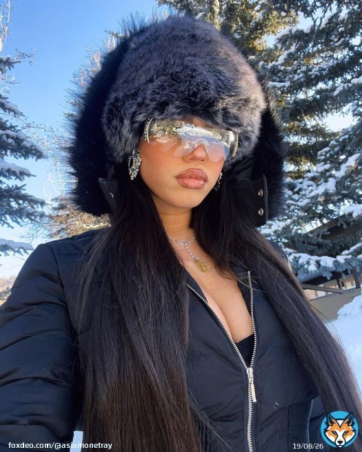Photo shared by Asia Monet \ud83c\udf39 on January 24, 2024 tagging @asiamonetray. May be an image of 1 person, fur coat, goosedown coat, snowsuit, parka, ski slope and snow.