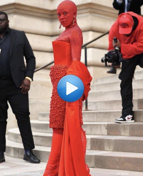 doja cat arrived to the schiaparelli show in paris wearing 30k swarovski red crystals