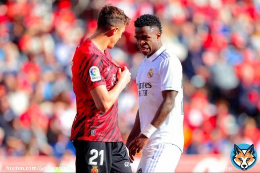 Mallorca captain Antonio Raillo telling Vinicius to kiss the Mallorca badge after Vinicius gestured towards Mallorca fans to kiss the Madrid badge at HT.   Note: There were some recent controversies surrounding Vini and Raillo.