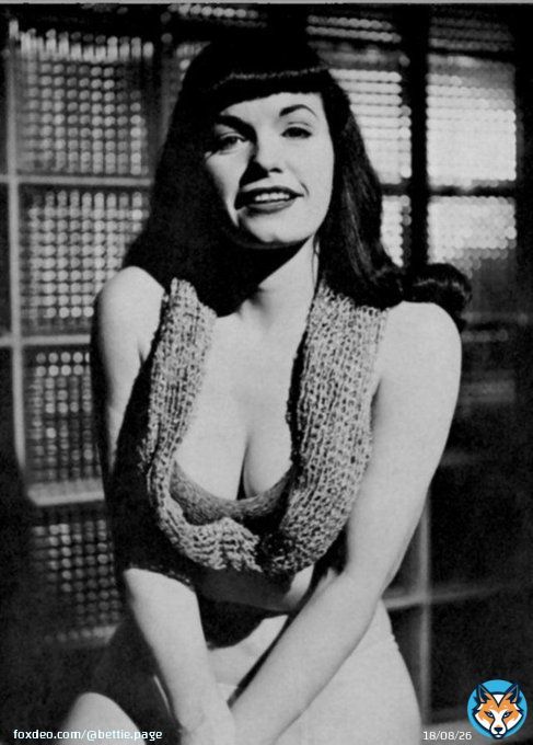Bettie taking the cropped sweater to new heights  Happy Friday, y&rsquo;all!   #pinup #bettiepage #1950s #sweaterweather #pinupqueen #retrostyle #bettiebangs