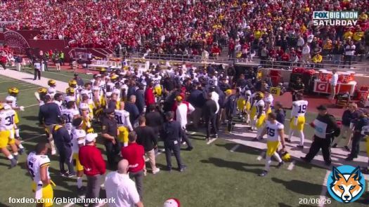 Michigan RB coach Mike Hart went down on the sideline after the Indiana TD, and was carted off the field.