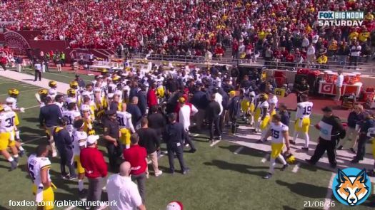 Michigan RB coach Mike Hart went down on the sideline after the Indiana TD, and was carted off the field.