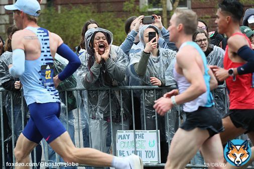 As thousands of runners embarked on a 26.2 mile trek from Hopkinton to Boston Monday, the weather was misty, chilly, and a little wet. But that didn&rsquo;t stop those in attendance from showing their support.