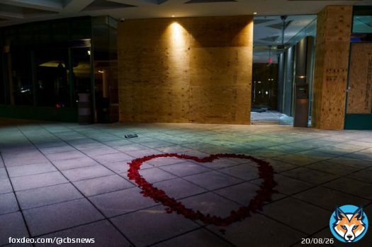 Rose petals lay at the entrance of the Old National Bank in Louisville, Kentucky in remembrance of the five victims killed Monday in a shooting by a former employee.