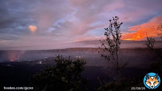 As the sun rose Monday on the Hawaiʻi Volcanoes National Park, the sky was ablaze with the glow of two erupting volcanoes