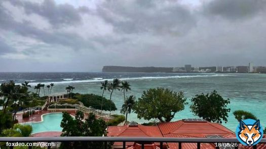 Typhoon Mawar&rsquo;s outer bands were whipping Guam Wednesday ahead of a potential landfall that could devastate the US territory with deadly winds, treacherous storm surge and heavy rainfall