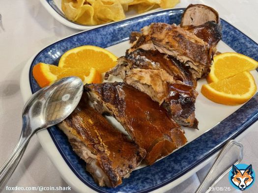 Suckling pig for lunch, topped it off with a Red Bull + Romeo y Julieta.   Gotta love the bull market.