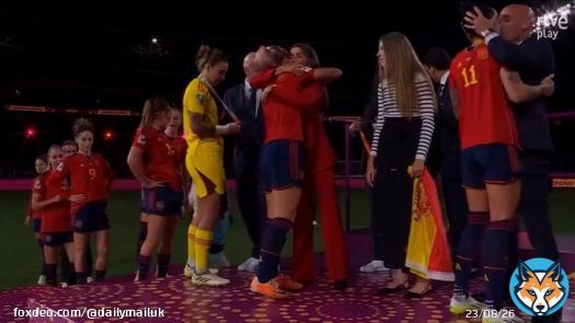 Moment president of Spanish FA kisses player on the MOUTH during trophy presentation after Spain's 1-0 win against England in World Cup final