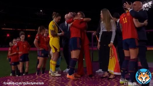 Moment president of Spanish FA kisses player on the MOUTH during trophy presentation after Spain's 1-0 win against England in World Cup final