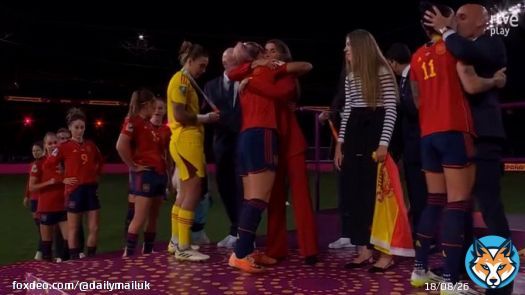 Moment president of Spanish FA kisses player on the MOUTH during trophy presentation after Spain's 1-0 win against England in World Cup final